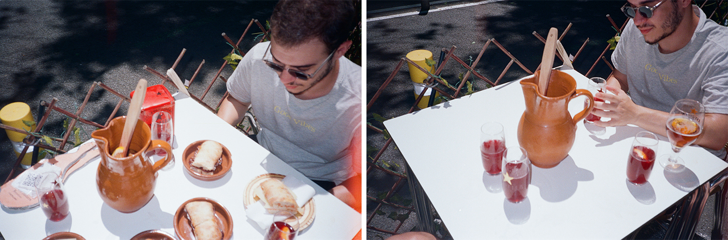 fotos do ritis tomando uma sangria na jarra clássica de barro e alguns bocadillos (sanduíches)